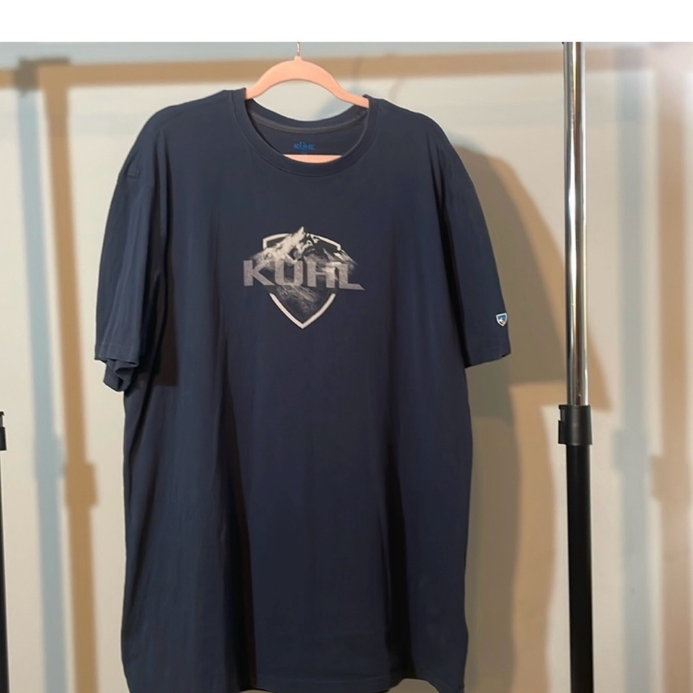Two Kuhl t shirts for the price of one. Navy blue is XXL and the black is XL.